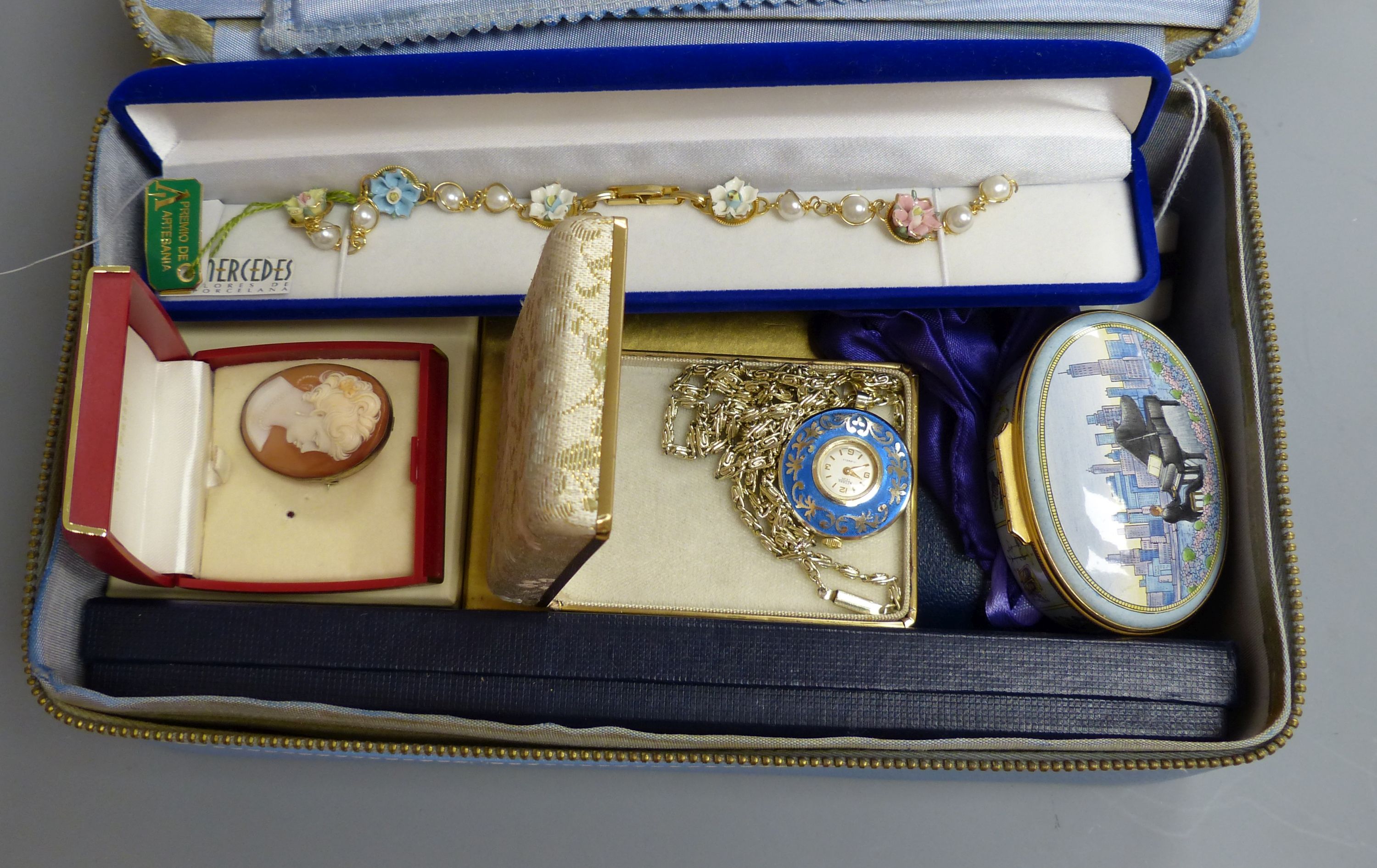 A Halcyon Days Gershwin 'Rhapsody in Blue' music box, no. 339/750, an engine-turned silver compact, three various watches and costume jewellery